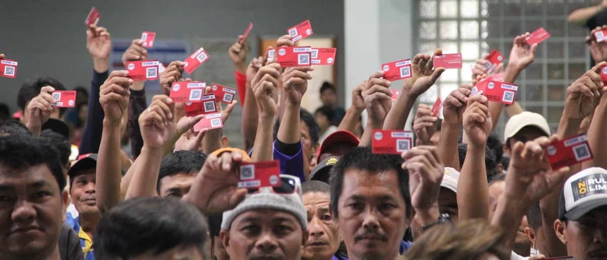 ‘WALANG Gutom’ Program beneficiaries from Palo, Leyte get their food stamp cards at the Palo Sports Complex on 18 July 2024.